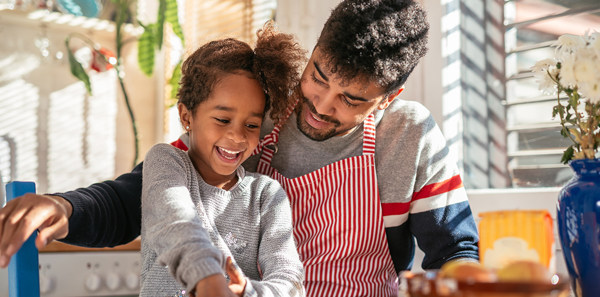 Father and daughter in the kitchen